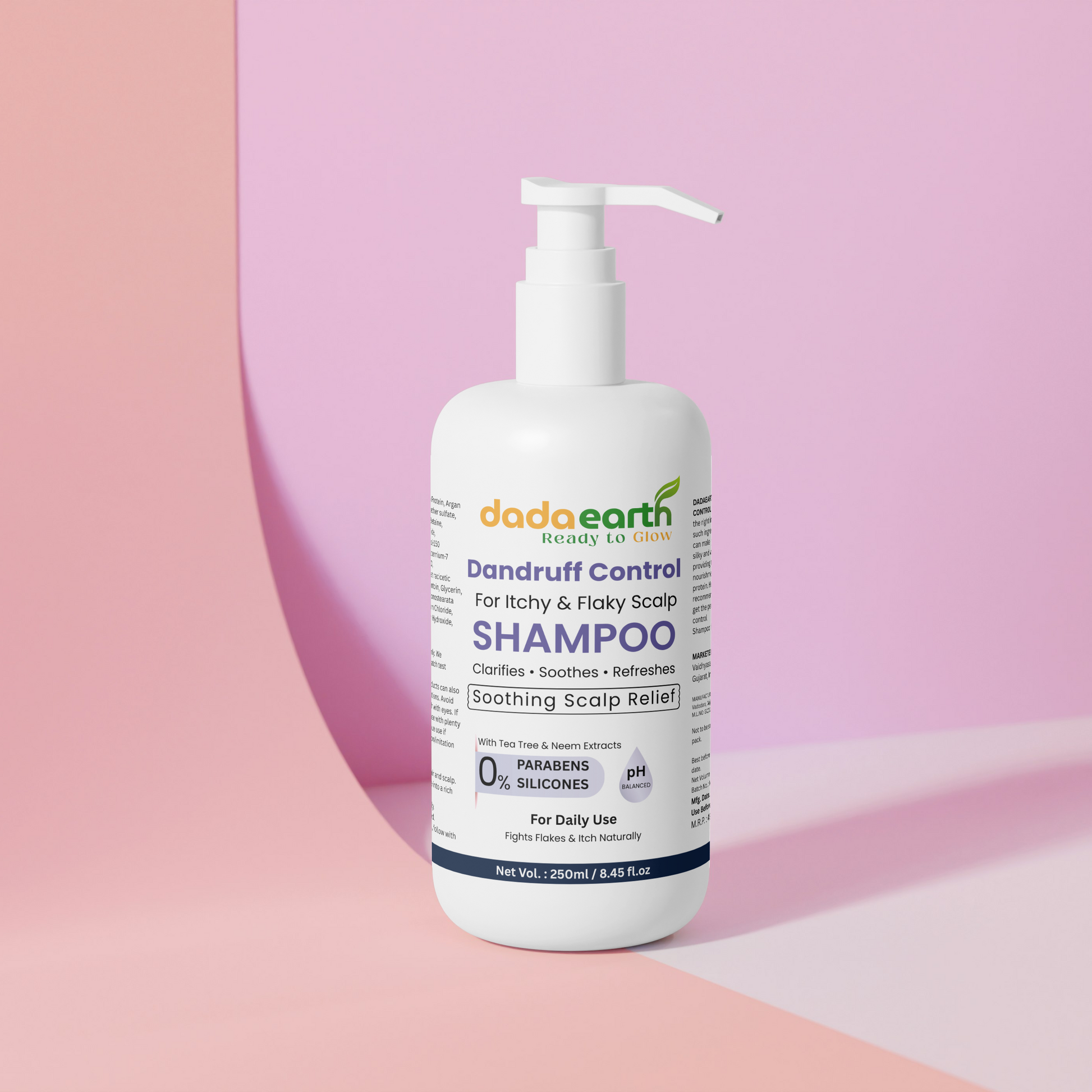 Dada Earth shampoo bottle on a pink background